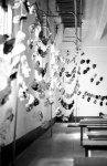 Masks made by San Francisco students, hanging in a room at Alcatraz Prison.
