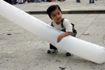 Kids playing with baloons in the Oaxacan zocalo